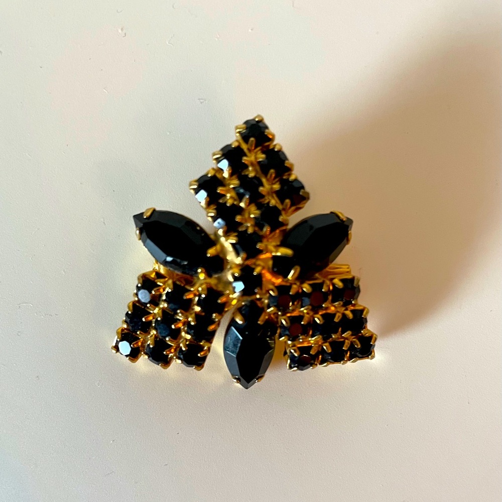 Vintage black and gold brooch